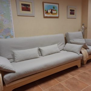 Sofa cama Nueva Linea Eco, con curvas externas y cojines